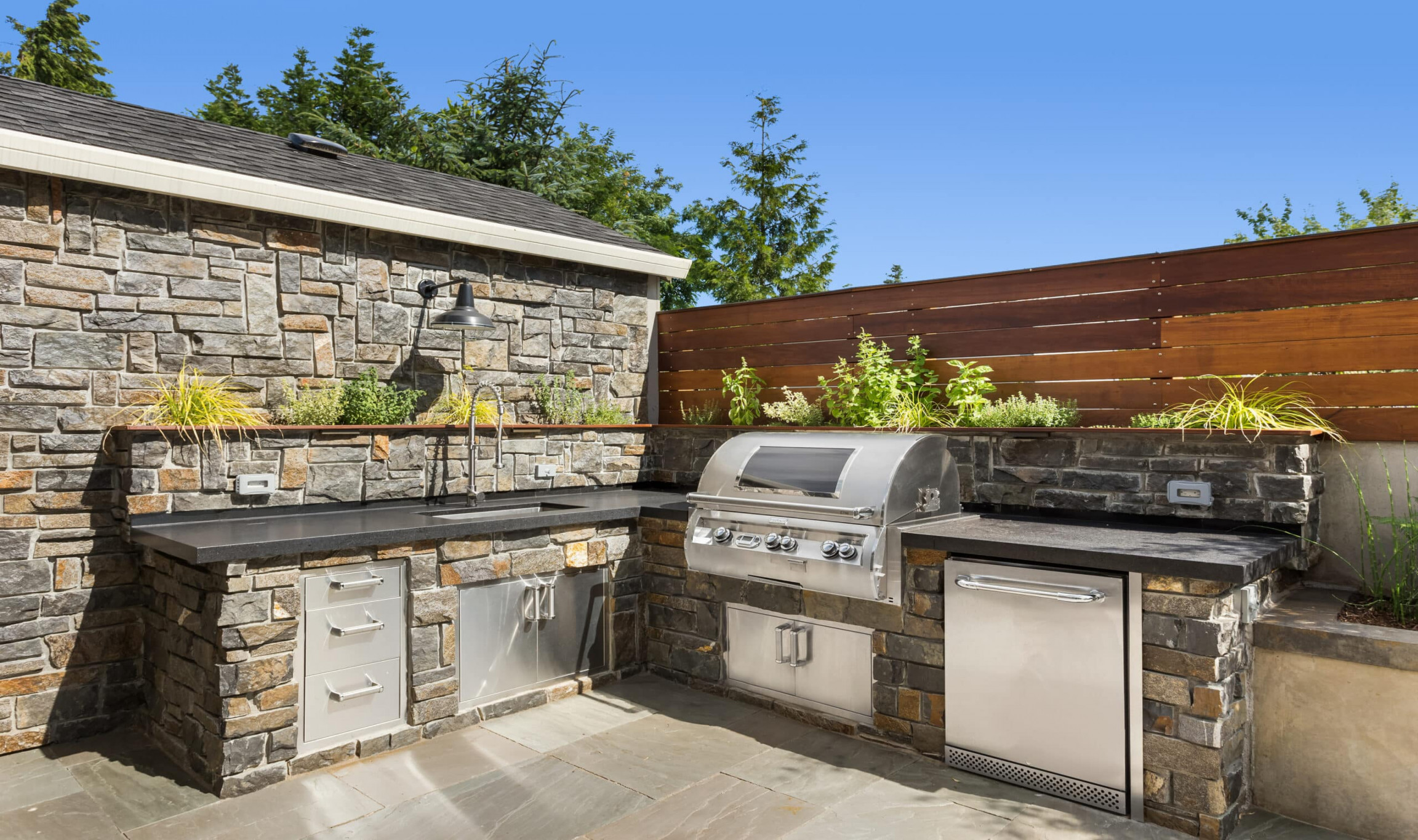 Benefits of a Natural Stone Outdoor Kitchen  Cosmos Surfaces