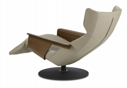Contemporary armchair / leather / with footstool / reclining