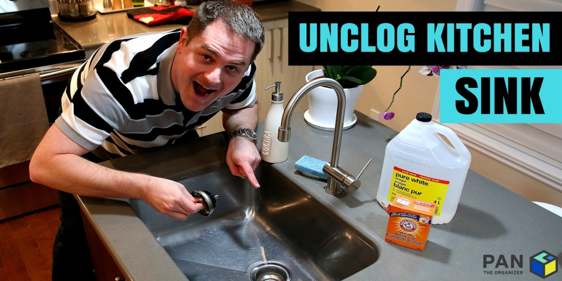 How to unclog a kitchen sink using baking soda and vinegar !!