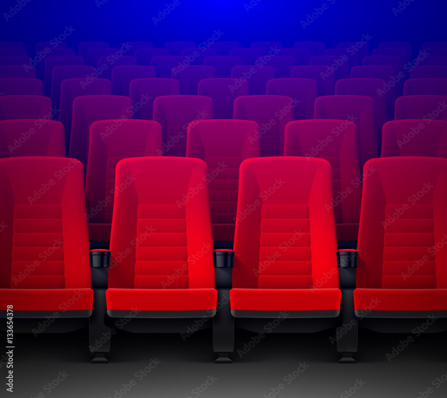 Movie theater with rows of red empty chairs and spotlight, cinema