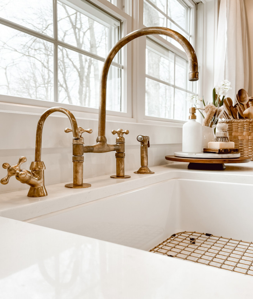 Our Unlacquered Brass Kitchen Faucets - Deb and Danelle