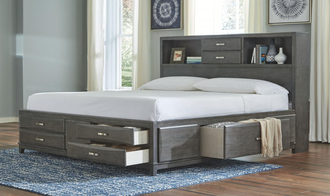 The Caitbrook Gray King Storage Bed With  Drawers is available at